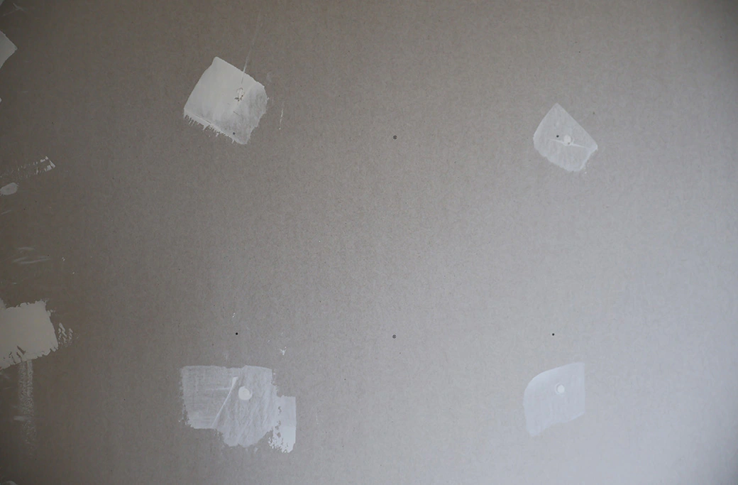 Joint compound applied to a drywall repair