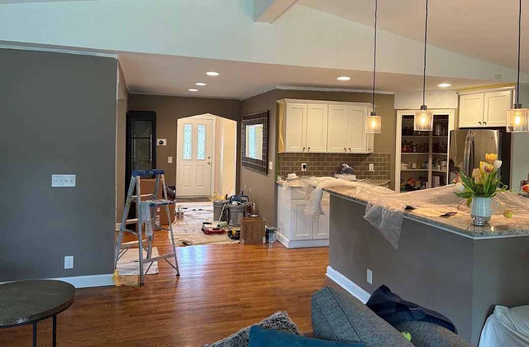 Sanded drywall patch prepared and painted
